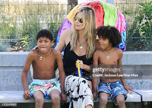 Heidi Klum, Henry Samuel and Johan Samuel are seen on June 20, 2013 in New York City.