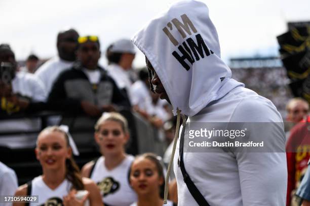 Cornerback/wide receiver Travis Hunter of the Colorado Buffaloes walks off the field at halftime of a game against the USC Trojans at Folsom Field on...