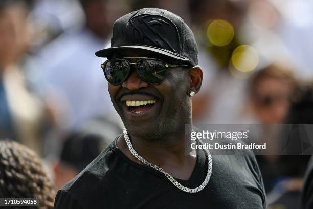 Former NFL player Michael Irvin stands on the sideline during a game between the Colorado Buffaloes and the USC Trojans at Folsom Field on September...