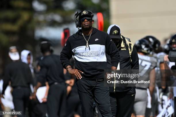 Head coach Deion Sanders of the Colorado Buffaloes looks on from the sideline in the third quarter against the USC Trojans at Folsom Field on...