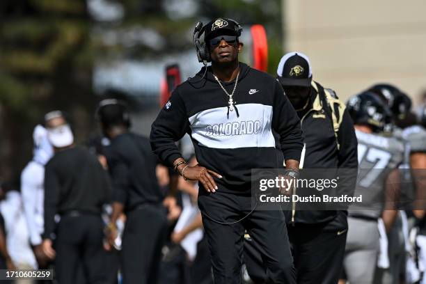 Head coach Deion Sanders of the Colorado Buffaloes looks on from the sideline in the third quarter against the USC Trojans at Folsom Field on...