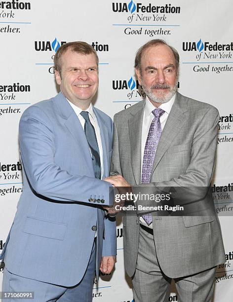 COlumbia Records CEO Rob Stringer and recording artist Neil Diamond attends UJA-Federation Of New York Music Visionary Of The Year Award Luncheon at...