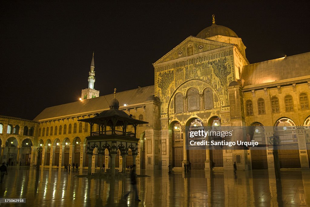 Umayyad Mosque brightly illuminated at night