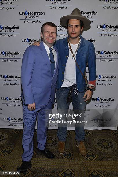 Rob Stringer and John Mayer attend a luncheon honoring Rob Stringer as UJA-Federation of New York Music Visionary of 2013 at The Pierre Hotel on June...