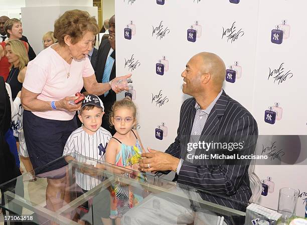 Professional Baseball Player Mariano Rivera signs EDT bottles during The Mariano Rivera Signature Limited Edition EDT At Lord & Taylor on June 21,...