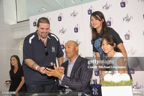 Professional Baseball Player Mariano Rivera signs EDT bottles during The Mariano Rivera Signature Limited Edition EDT At Lord & Taylor on June 21,...