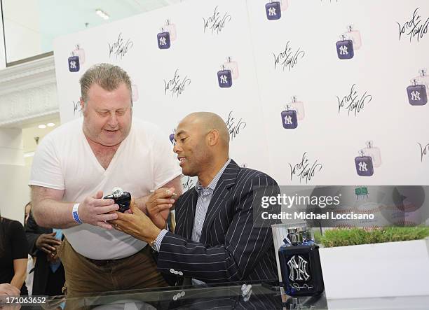 Professional Baseball Player Mariano Rivera signs EDT bottles during The Mariano Rivera Signature Limited Edition EDT At Lord & Taylor on June 21,...