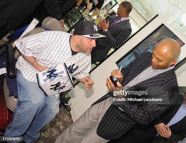 Professional Baseball Player Mariano Rivera signs EDT bottles during The Mariano Rivera Signature Limited Edition EDT At Lord & Taylor on June 21,...