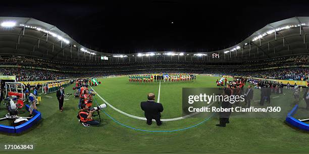 The teams line up prior to the FIFA Confederations Cup Brazil 2013 Group B match between Nigeria and Uruguay at Estadio Octavio Mangabeira on June...