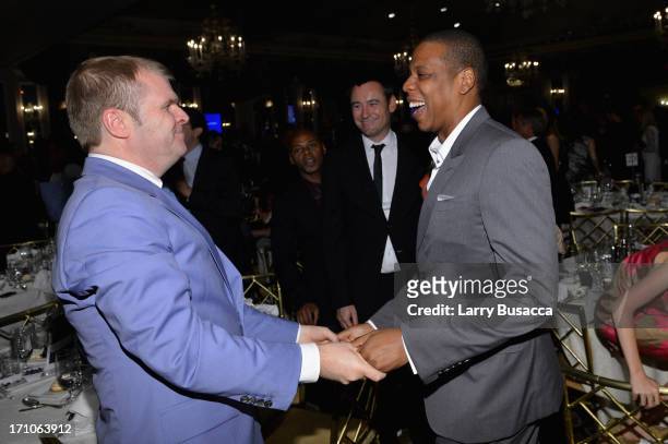 Rob Stringer and Jay-Z attend a luncheon honoring Rob Stringer as UJA-Federation of New York Music Visionary of 2013 at The Pierre Hotel on June 21,...