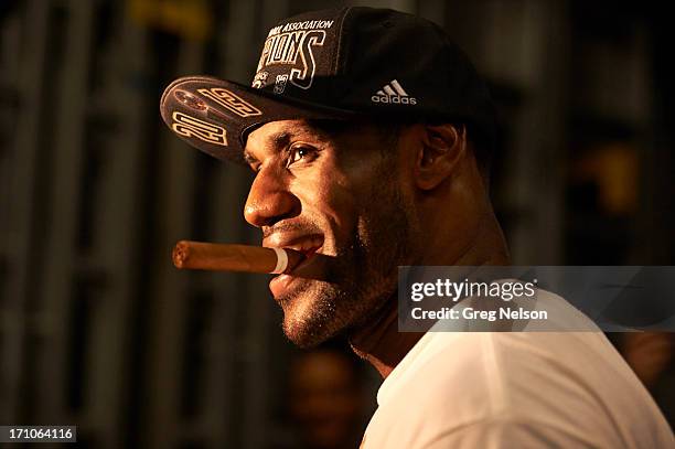 Finals: Closeup of Miami Heat LeBron James victorious with cigar after winning Game 7 and series vs San Antonio Spurs at American Airlines Arena....