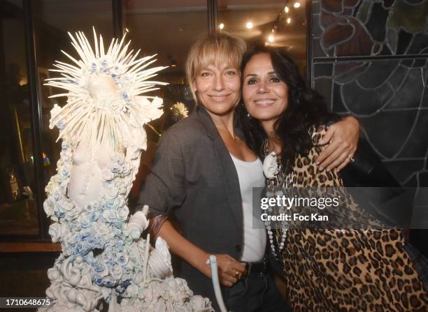 Actresses Catherine Wilkening and Julie Debazac pose during Catherine Wilkening's Open House Sculpture Exhibition Preview in on September 30, 2023 in...