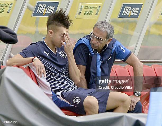 Stephan El Shaarawy and the doctor Enrico Castellacci attend Italy Training at Estadio Octavio Mangabeira on June 21, 2013 in Salvador, Brazil.