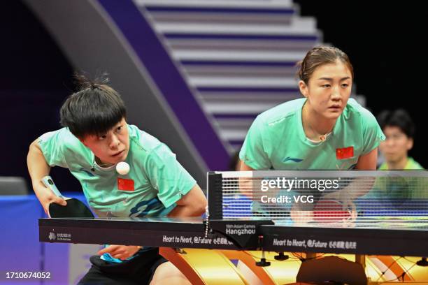 Chen Meng and Wang Yidi of China compete against Sutirtha Mukherjee and Ayhika Mukherjee of India in the Table Tennis - Women's Doubles Quarterfinal...