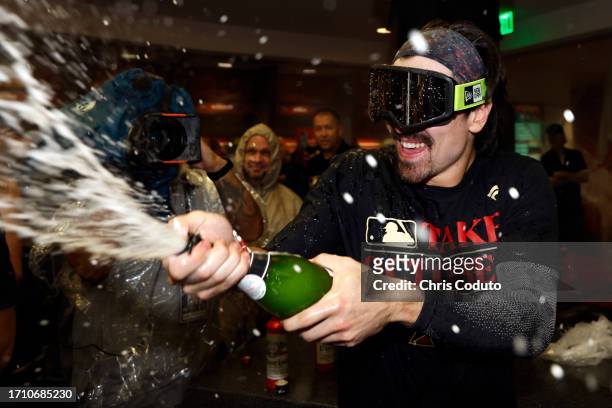 Corbin Carroll of the Arizona Diamondbacks celebrates after the Diamondbacks clinched a National League Wild Card playoff spot after the game against...