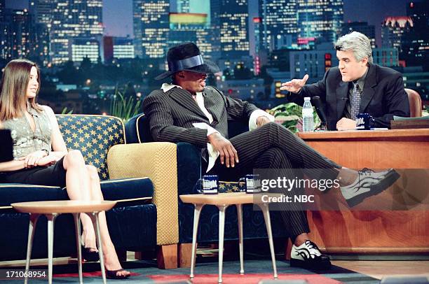Episode 1535 -- Pictured: Actress Mira Sorvino, basketball player Dennis Rodman, host Jay Leno during an interview on January 22, 1999 --