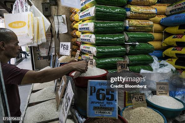 Economic Rice Display Prices of local and imported rice is displayed at market stall in ...