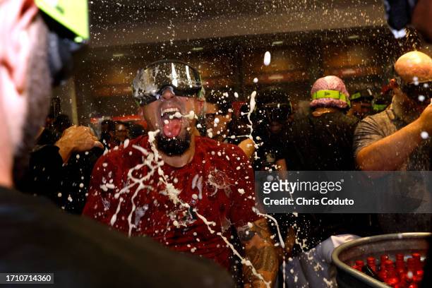 Arizona Diamondbacks players celebrate after clinching a National League Wild Card playoff spot after the game against the Houston Astros at Chase...