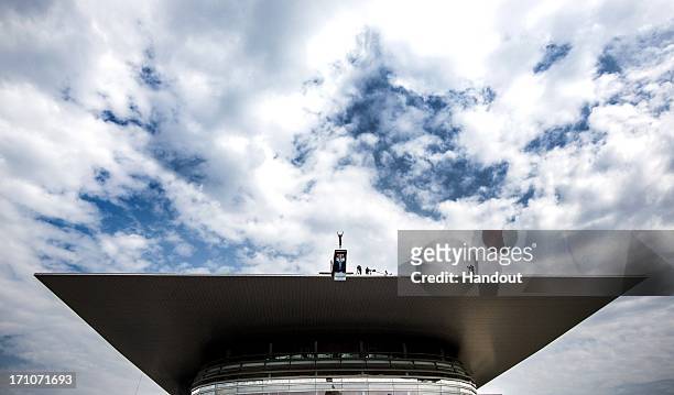 In this handout image provided by Red Bull, Sasha Kutsenko of Ukraine dives from the 28-metre platform at the Copenhagen Opera House during the first...