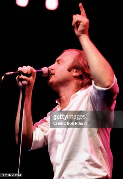 Singer and Musician Phil Collins with Genesis Band performs in concert at Inglewood Forum, October 16, 1986 in Inglewood, California.