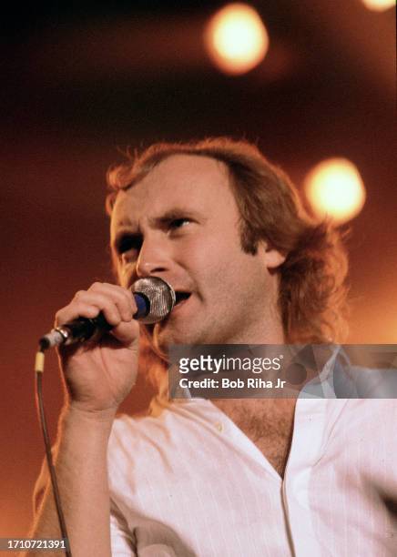 Singer and Musician Phil Collins with Genesis Band performs in concert at Inglewood Forum, October 16, 1986 in Inglewood, California.