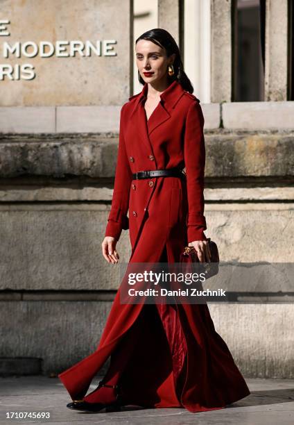 Mary Leest is seen wearing an Elie Saab red coat, red Elie Saab bag with black belt outside the Elie Saab show during the Womenswear Spring/Summer...