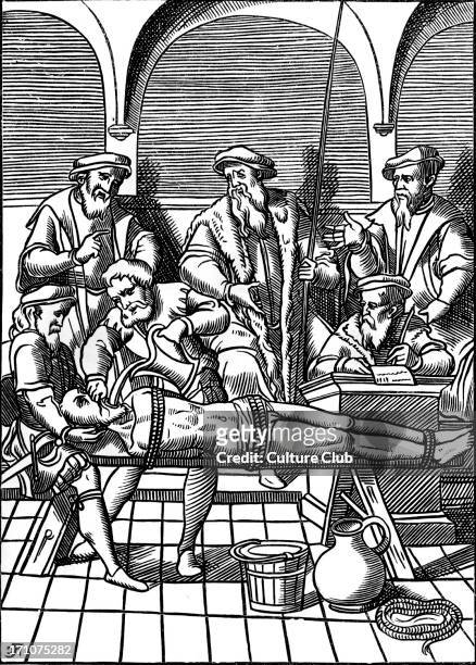Medieval torture scene. French water torture: the man has nine pints of water poured down his throat. Woodcut from 'Praxis Criminis Persequendi'. 1556