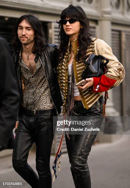 Guests are seen outside the Alexander McQueen show during the Womenswear Spring/Summer 2024 as part of Paris Fashion Week on September 30, 2023 in...