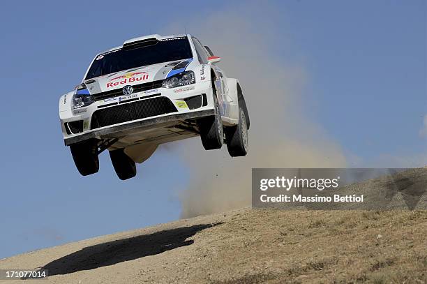 Jari Matti Latvala of Finland and Mikka Anttila of Finland compete in their Volkswagen Motorsport Polo R WRC during Day One of the WRC Italy on June...