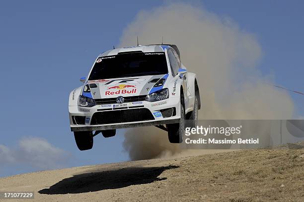 Sebastien Ogier of France and Julien Ingrassia of France compete in their Volkswagen Motorsport Polo R WRC during Day One of the WRC Italy on June...