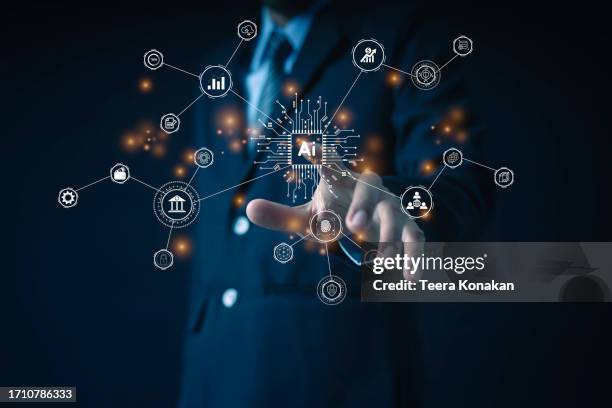 artificial intelligence technology concept with ai text on electronic circuit board. - transformación digital fotografías e imágenes de stock