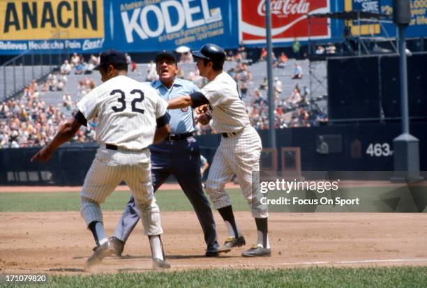 Elston Howard of the New York Yankees argues with an umpire during an Major League Baseball game circa 1972 at Yankee Stadium in the Bronx borough of...