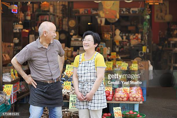 mr. and mrs. owner of the japanese vegetable store - retail place stock pictures, royalty-free photos & images