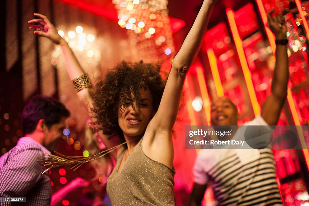 Friends dancing at nightclub