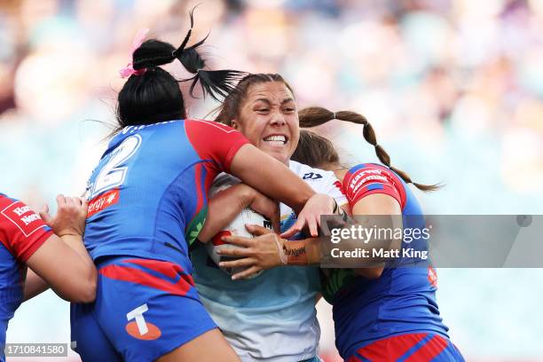 Shannon Mato of the Titans is tackled during the 2023 NRLW Grand Final match between Newcastle Knights and Gold Coast Titans at Accor Stadium, on...