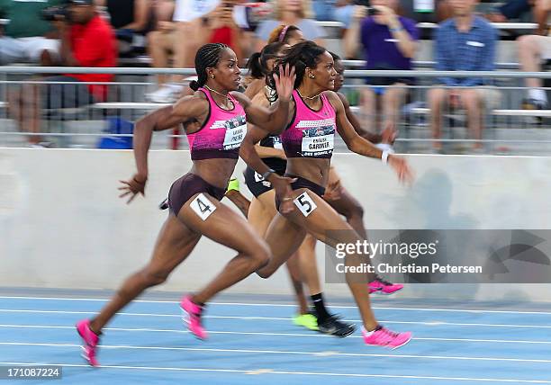 English Gardner leads the pack en route to winning the Women's 100 Meter Dash final on day two of the 2013 USA Outdoor Track & Field Championships at...