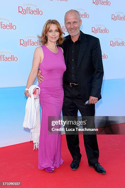 Tina Ruland and Claus G. Oldoerp attend the Raffaello Summer Day 2013 at Kronprinzenpalais on June 21, 2013 in Berlin, Germany.