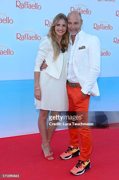 Simon Licht and Theresa Krentzlin attend the Raffaello Summer Day 2013 at Kronprinzenpalais on June 21, 2013 in Berlin, Germany.
