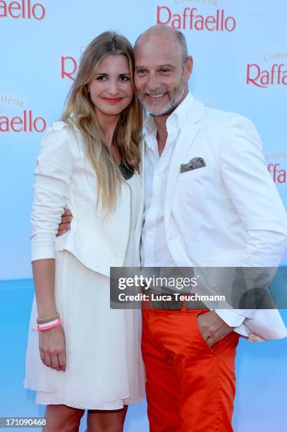 Simon Licht and Theresa Krentzlin attend the Raffaello Summer Day 2013 at Kronprinzenpalais on June 21, 2013 in Berlin, Germany.