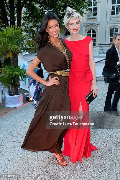 Rebecca Mir and Anika Scheibe attend the Raffaello Summer Day 2013 at Kronprinzenpalais on June 21, 2013 in Berlin, Germany.