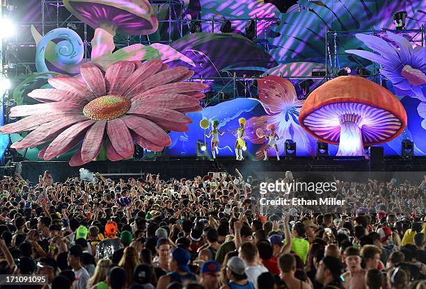 Dancers perfom onstage at the 17th annual Electric Daisy Carnival at Las Vegas Motor Speedway on June 21, 2013 in Las Vegas, Nevada.