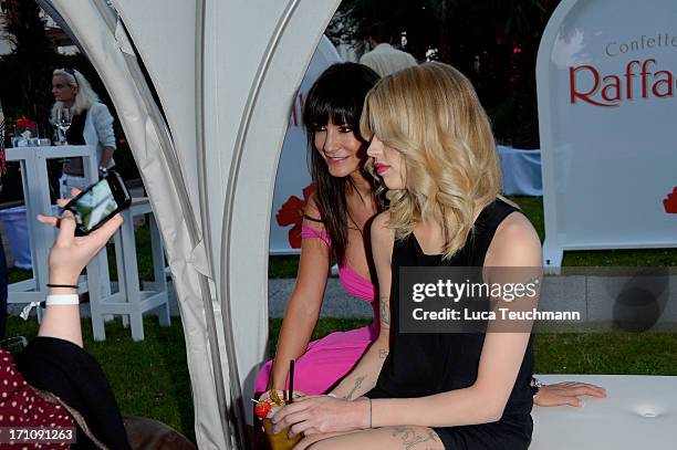 Mariella Ahrens and Peaches Geldof attend the Raffaello Summer Day 2013 at Kronprinzenpalais on June 21, 2013 in Berlin, Germany.