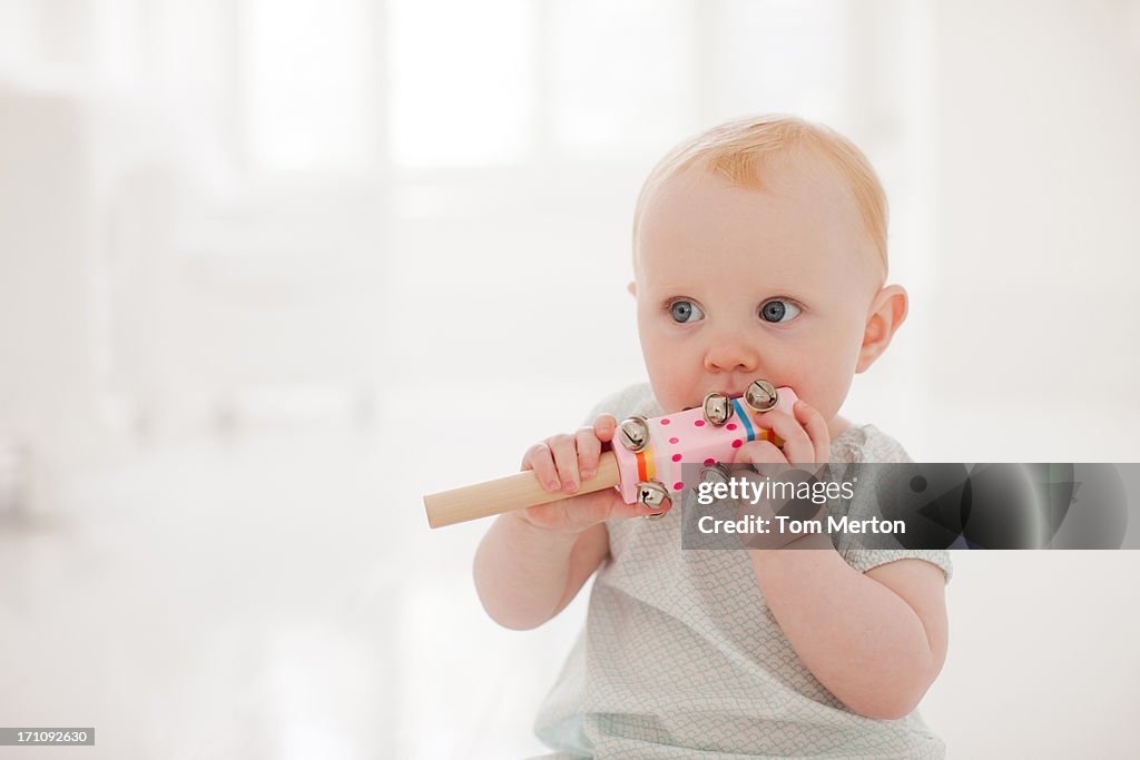 Baby sitting on floor