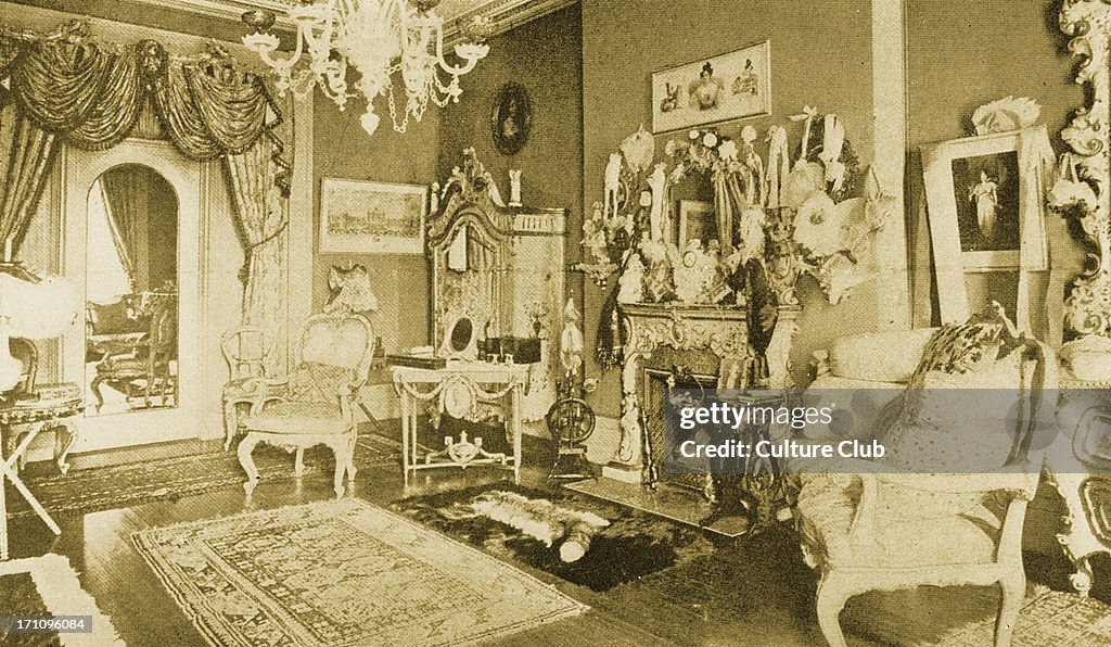 Luxurious interior from the 1890s. Caption reads: 'A sitting room in ...