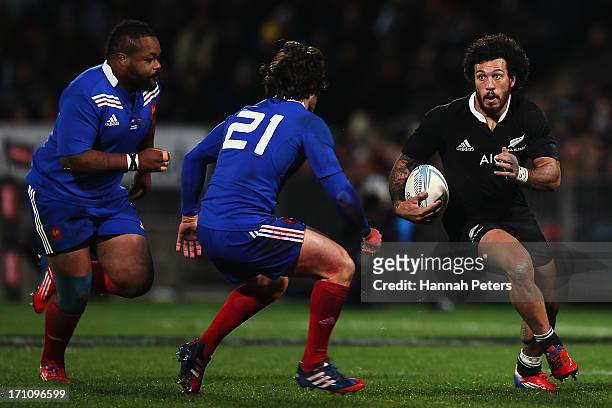 Rene Ranger of the All Blacks makes a break during the Third Test Match between the New Zealand All Blacks and France at Yarrow Stadium on June 22,...