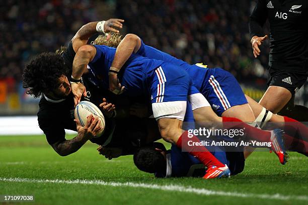 Rene Ranger of the All Blacks is taken out to touch during the Third Test Match between the New Zealand All Blacks and France at Yarrow Stadium on...