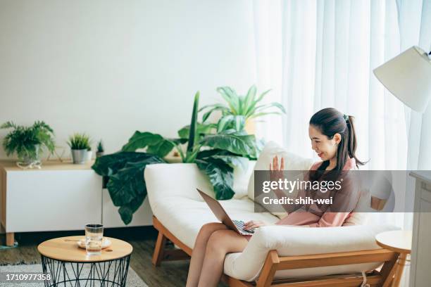 young asian woman working from home, - taiwanese people stock pictures, royalty-free photos & images