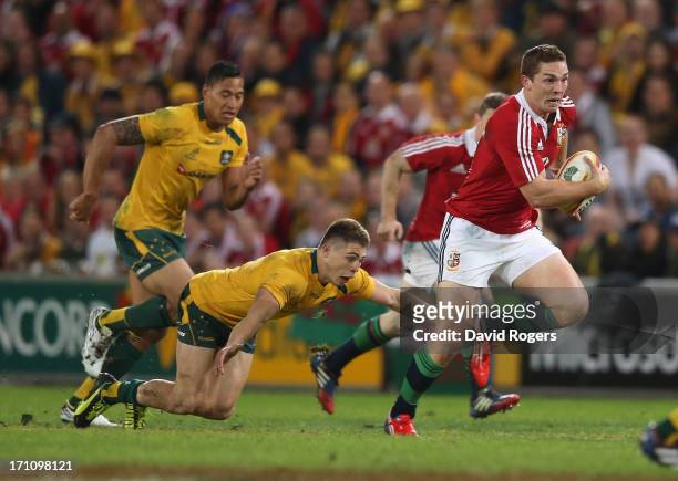 George North of the Lions breaks clear to score the first Lions try during the First Test match between the Australian Wallabies and the British &...