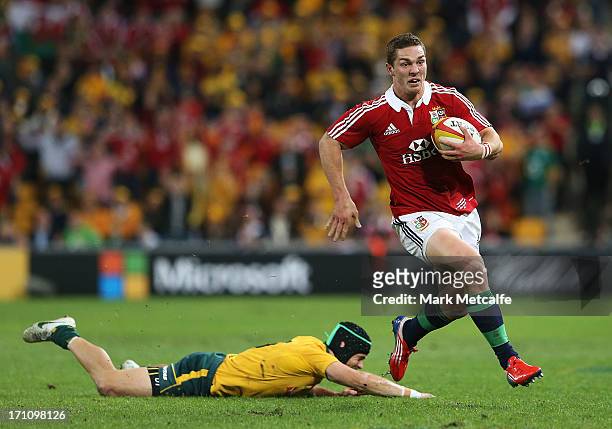 George North of the Lions breaks free to score a try during the First Test match between the Australian Wallabies and the British & Irish Lions at...