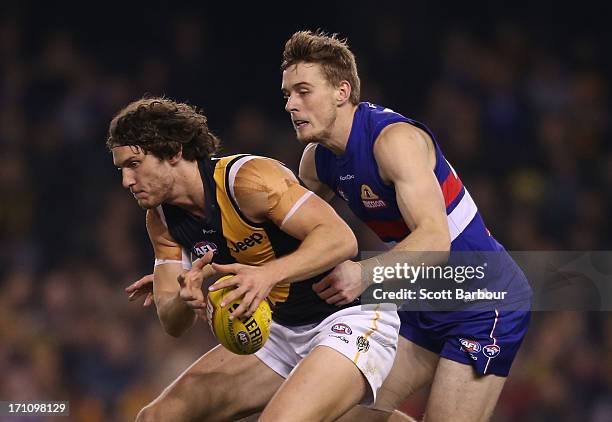 Ty Vickery of the Tigers competes for the ball during the round 13 AFL match between the Western Bulldogs and the Richmond Tigers at Etihad Stadium...